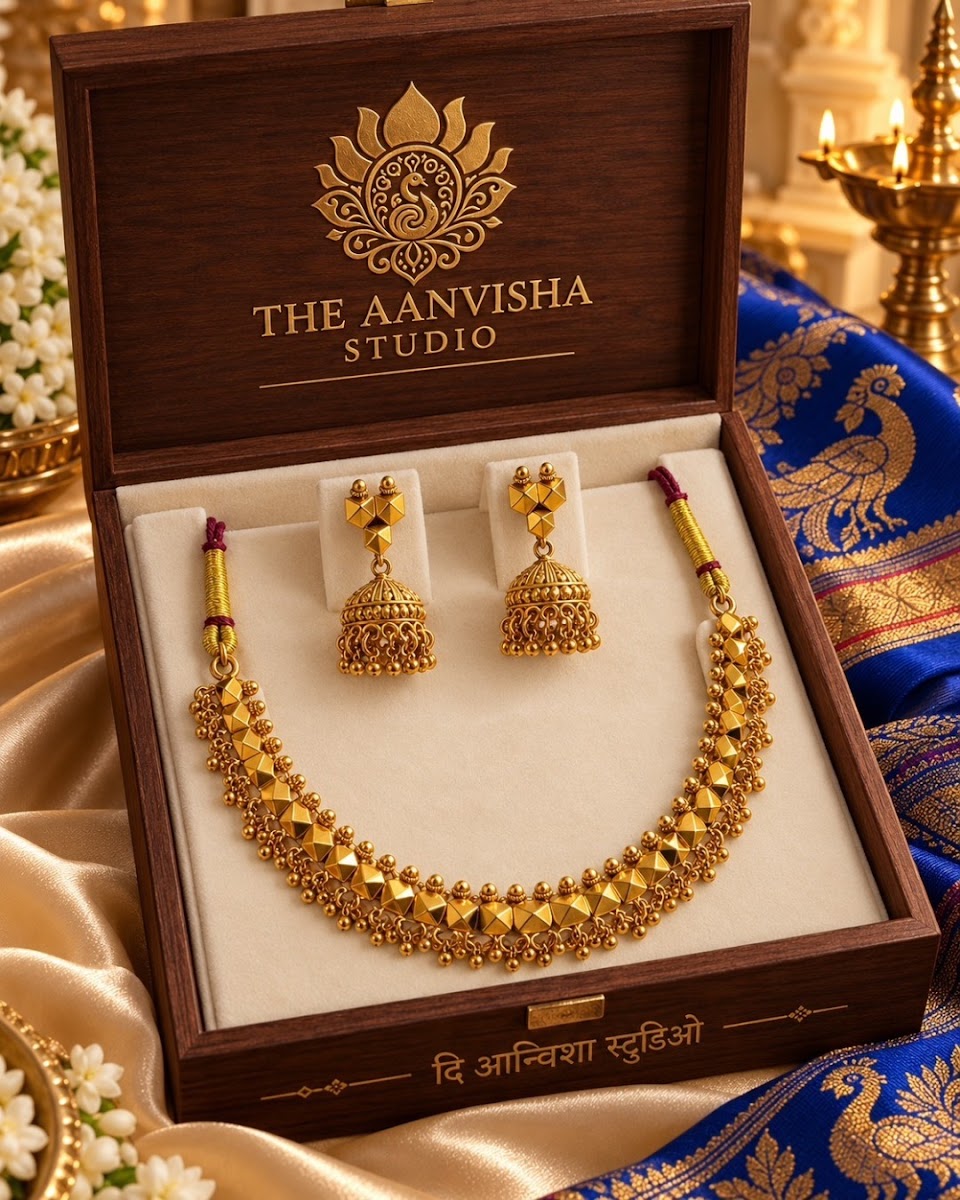 The Aanvisha Studio Signature Wooden Heirloom Box with Geometric Gold Choker and Jhumkas